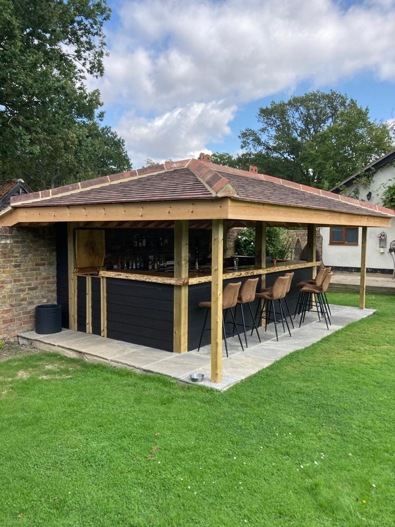 Completed outdoor bar and gazebo with tiled roof
