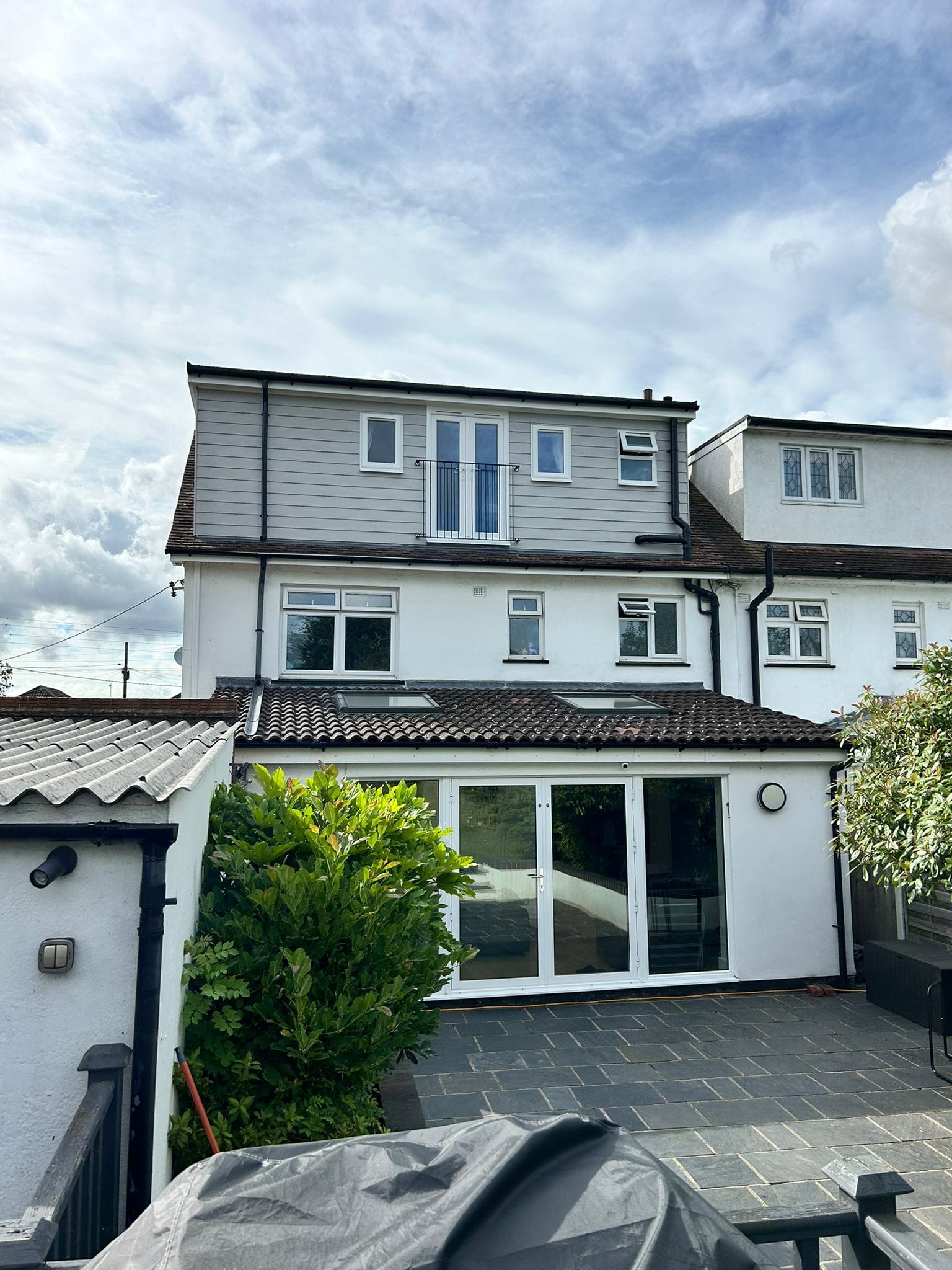 Completed house showing loft conversion and ground floor extension